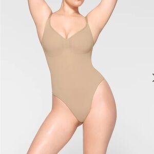 Skims sculpting thong bodysuit size 2XL